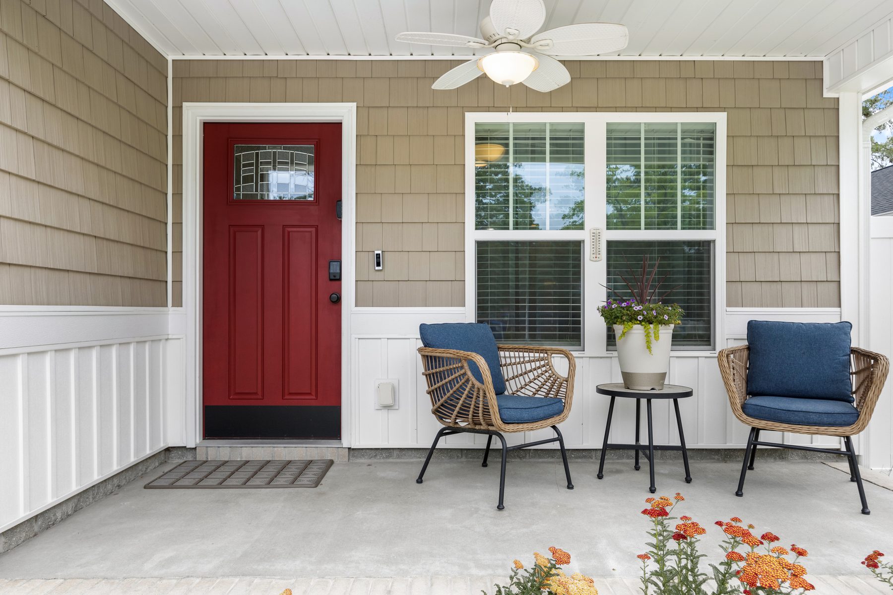 Front porch with red door